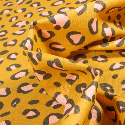 Tissu Coton imprimé Léo sur fond Jaune moutarde