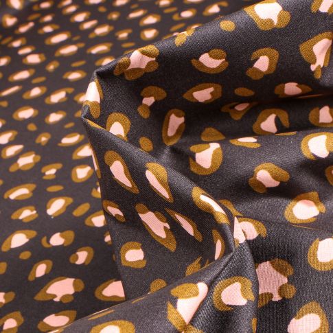 Tissu Coton enduit Fauve sur fond Noir
