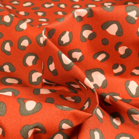 Tissu Coton enduit Fauve sur fond Orange