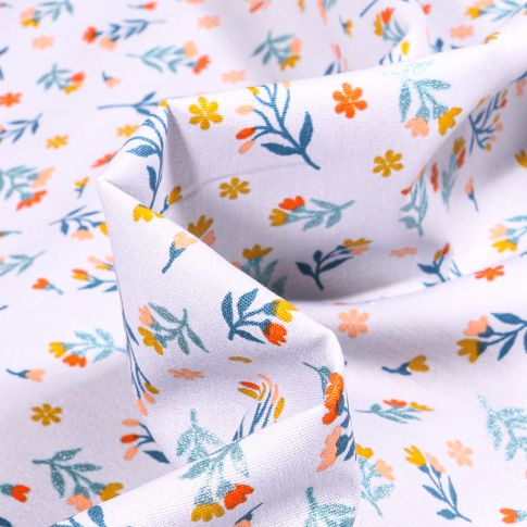 Tissu Coton imprimé  Lia sur fond Bleu ciel