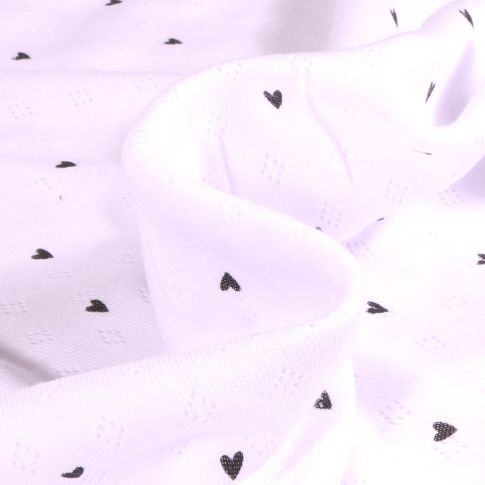 Tissu jersey ajouré Heart sur fond Blanc