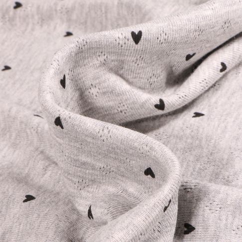 Tissu jersey ajouré Heart sur fond Gris chiné