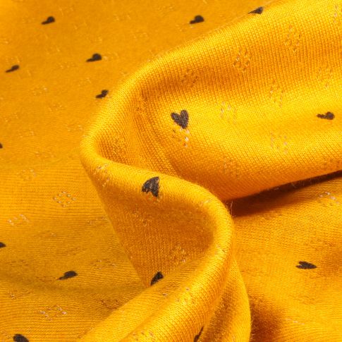 Tissu jersey ajouré Heart sur fond Jaune
