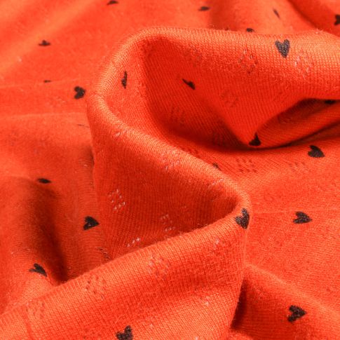 Tissu jersey ajouré Heart sur fond Orange