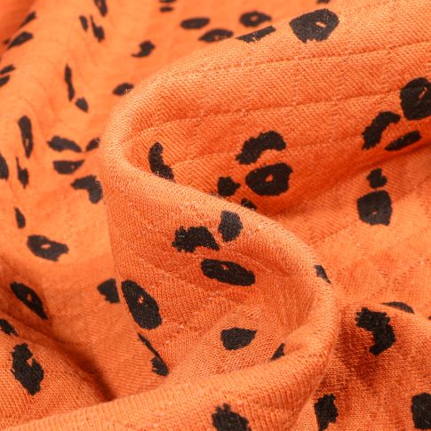 Tissu Sweat matelassé Tacheté Léo sur fond Orange
