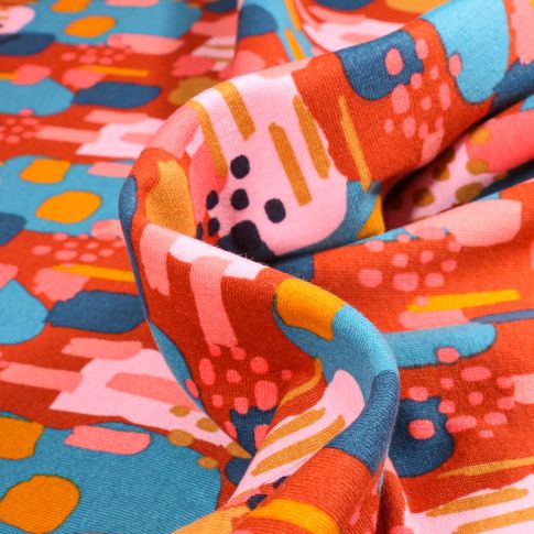 Tissu Sweat envers minky Bio Nallie sur fond Orange