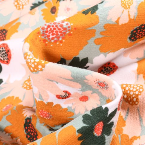 Tissu Jersey Coton envers molletonné Bio Tournesol sur fond Ecru