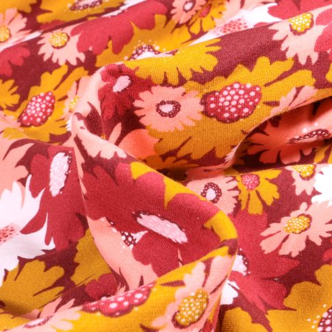 Tissu Jersey Coton envers molletonné Bio Tournesol sur fond Bordeaux