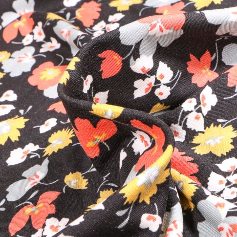 Tissu Jersey Modal Fleurs colorées sur fond Noir