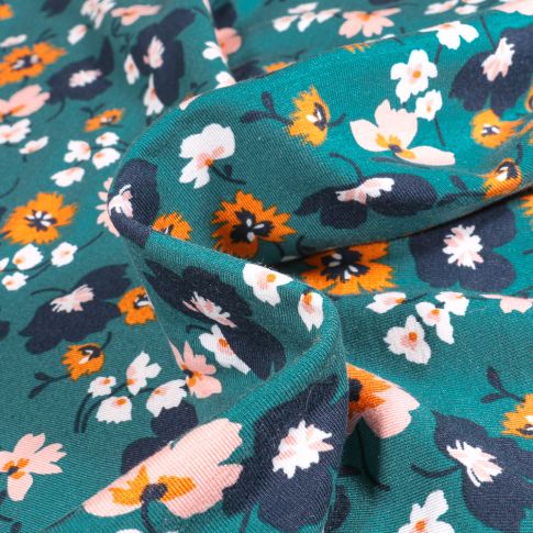 Tissu Jersey Modal Fleurs colorées sur fond Bleu pétrole