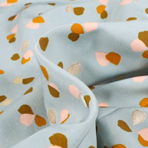 Tissu Satin imprimé Iza sur fond Bleu clair