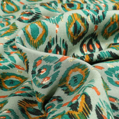 Tissu Viscose lurex Paon sur fond Vert menthe