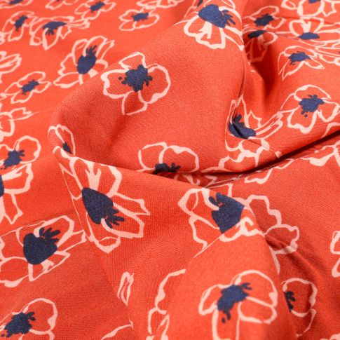 Tissu Viscose extensible  Fleurs stylisées sur fond Orange