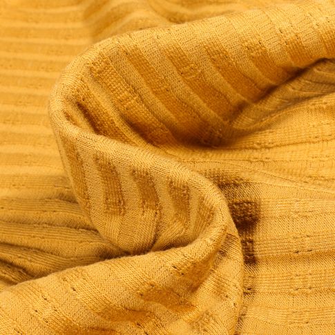Tissu Maille Côtelé ajouré sur fond Ocre