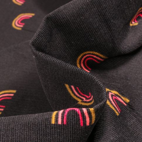 Tissu Velours milleraies Arc en ciel sur fond Noir