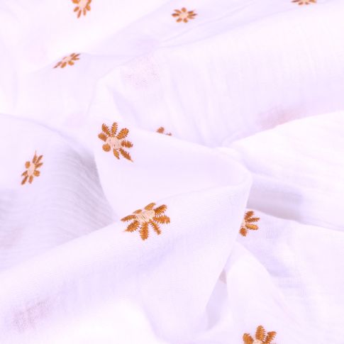 Tissu Double gaze Pâquerettes brodées sur fond Blanc