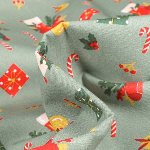 Tissu Coton imprimé Cadeaux et chaussettes de noël sur fond Vert d'eau