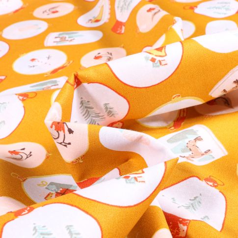 Tissu Coton imprimé Boules de noël décorées sur fond Jaune