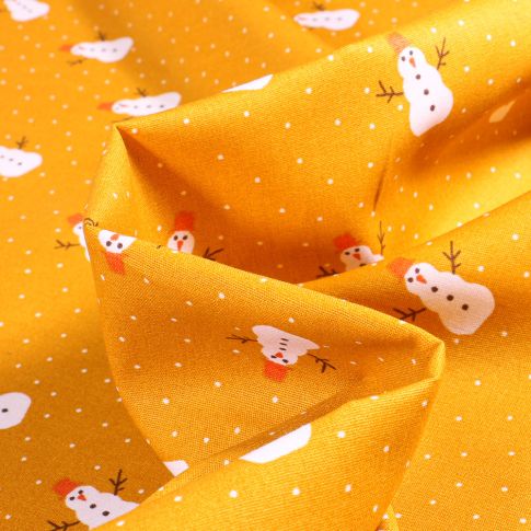 Tissu Coton imprimé Bonhomme de neige sur fond Jaune