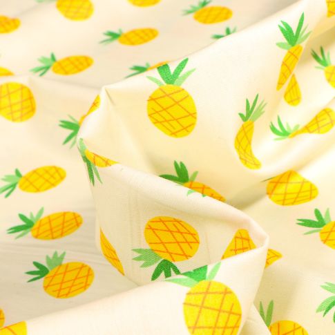 Tissu Coton popeline imprimé Ananas sur fond Jaune pastel