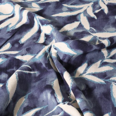 Tissu Viscose extensible Formes végétales blanches sur fond Bleu