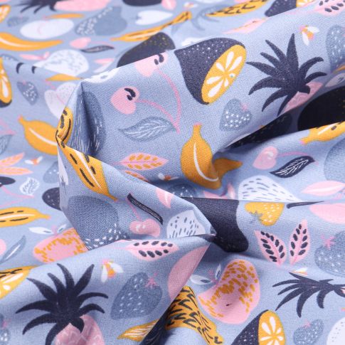Tissu Coton enduit Fruits variés et colorés sur fond Bleu ciel