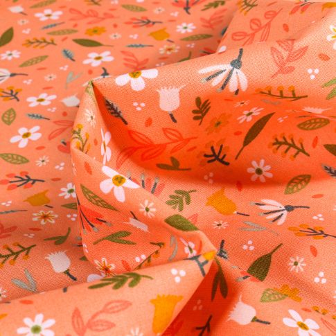 Tissu Coton imprimé Flower power sur fond Melon