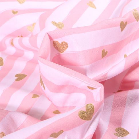 Tissu Coton imprimé Rayures et cœurs dorés sur fond Rose bébé