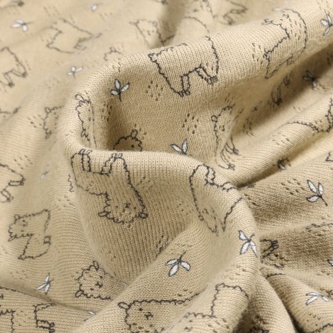 Tissu Jersey ajouré Alpaga sur fond Vert kaki clair