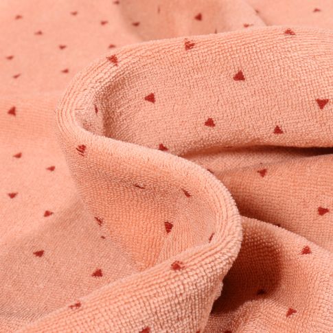 Tissu Jersey Velours Eponge Mini triangle sur fond Saumon