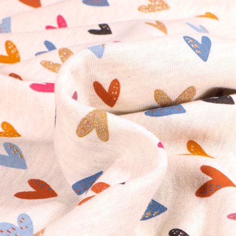 Tissu Jersey Coton envers Molleton Heart sur fond Beige chiné