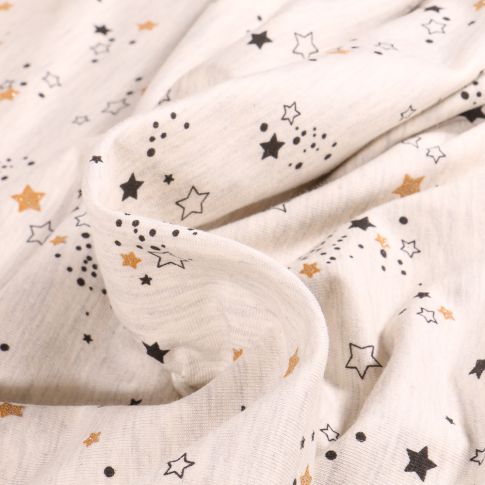 Tissu Jersey Coton Star's sur fond Beige chiné