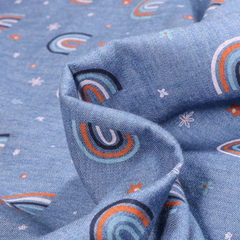 Tissu Chambray imprimé Arc en ciel et fleurs sur fond Bleu