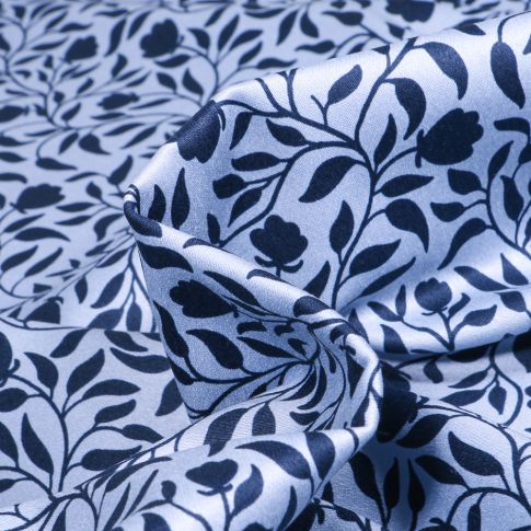 Tissu Coton Satiné extensible Ludmi sur fond Bleu