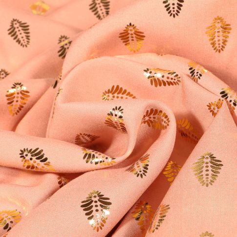 Tissu Viscose Feuilles métallisées dorées sur fond Saumon