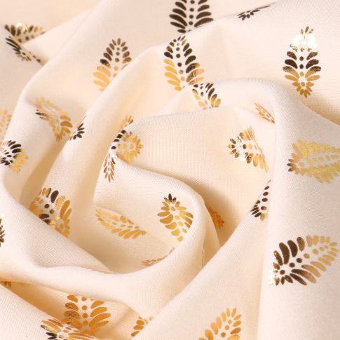 Tissu Viscose Feuilles métallisées dorées sur fond Ecru