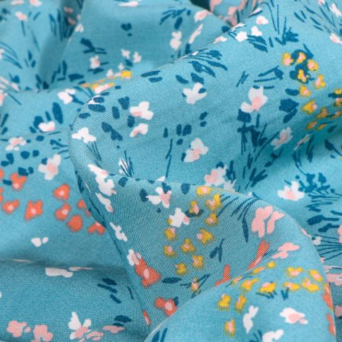 Tissu Viscose Dahlia sur fond Bleu turquoise