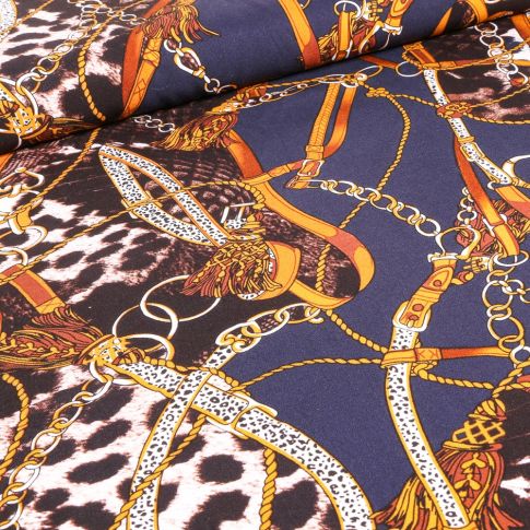 Tissu Viscose Motifs chaines et cuir sur fond Bleu