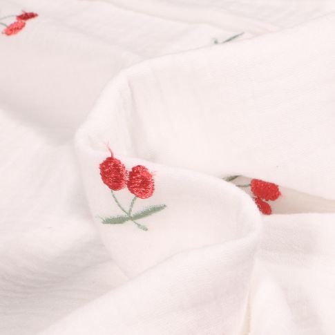 Tissu Double gaze Cerise brodées sur fond Blanc