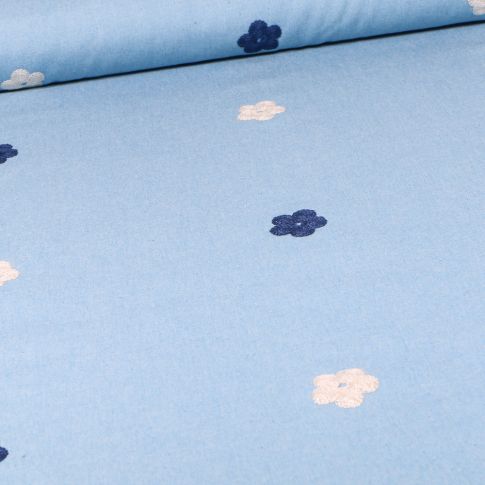 Tissu Chambray Pâquerettes brodées sur fond Bleu clair