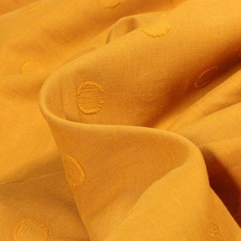 Tissu Voile de Coton Pois texturé sur fond Ocre