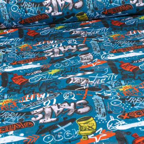 Tissu Jersey Coton envers gratté Street art sur fond Bleu turquoise