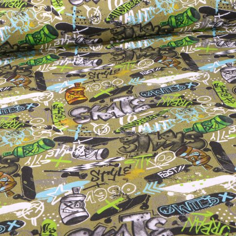 Tissu Jersey Coton envers gratté Street art sur fond Vert kaki