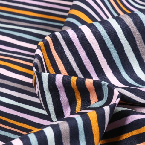 Tissu Coton enduit Rayures multicolores sur fond Bleu marine