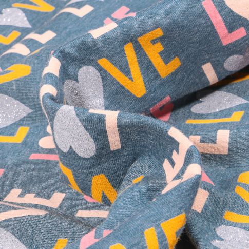 Tissu Jersey Coton LOVE sur fond Bleu chiné