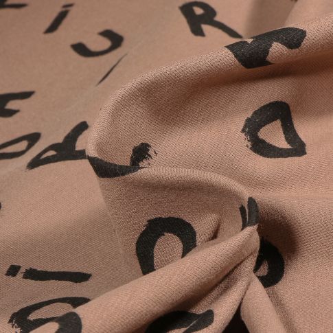 Tissu Sweat envers molletonné Alpha sur fond Cappuccino