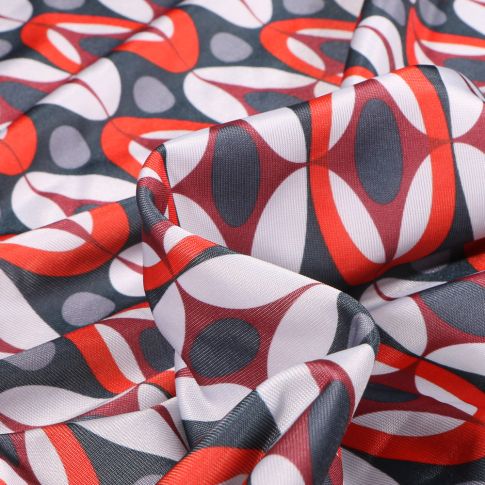 Tissu Lycra léger Formes abstraites rouges sur fond Gris anthracite