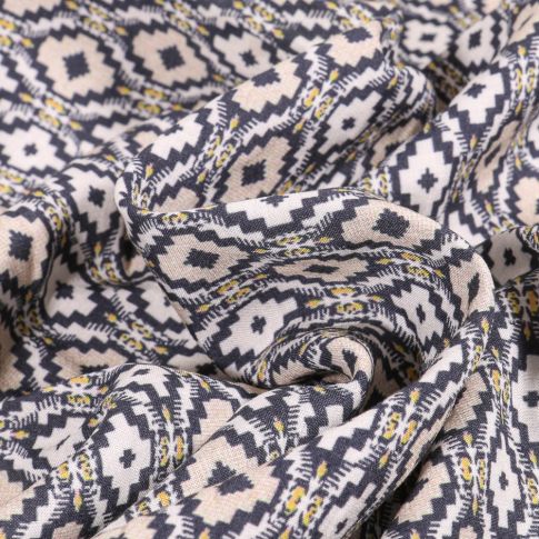 Tissu Viscose Motifs aztèques sur fond Blanc cassé
