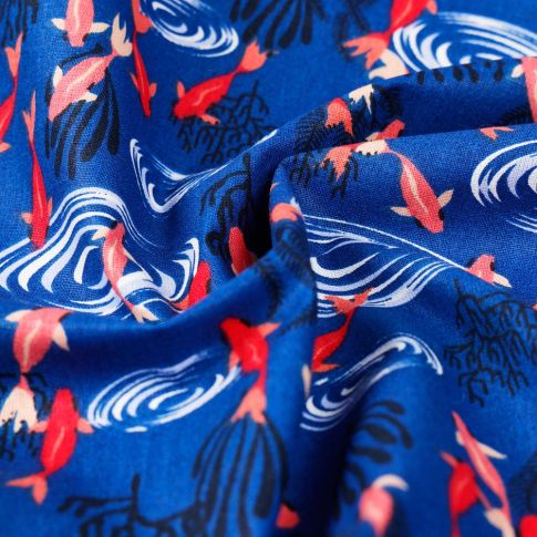 Tissu Coton imprimé petits poissons rouges sur fond Bleu roi