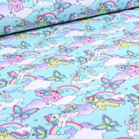 Tissu Coton imprimé sous licence My little Pony sur fond Bleu turquoise